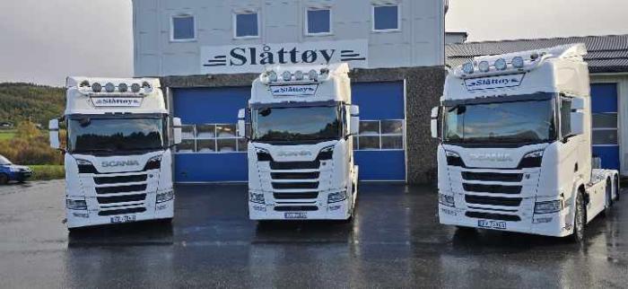 Hans Ivar Slåttøy Transport AS logo